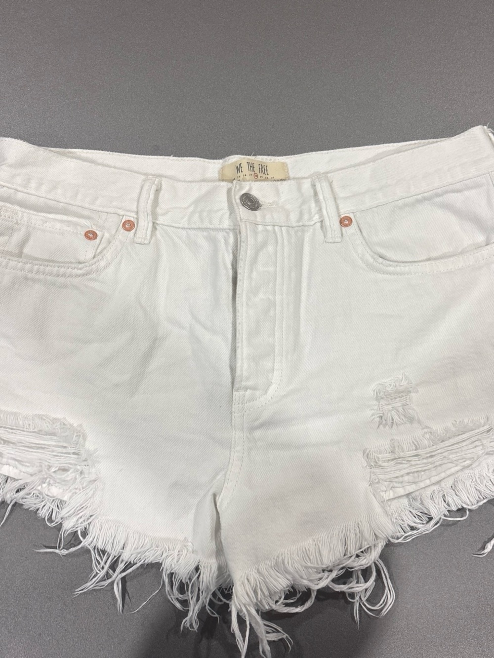 We The Free White Frayed Denim Cutoff Shorts
